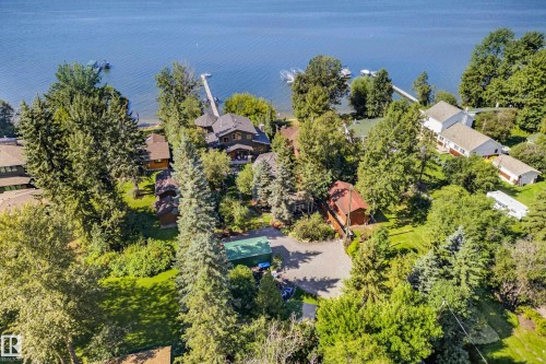 Waterfront property with extensive tree coverage and multiple structures - 51 Itaska Beach, Rural Leduc County, AB 