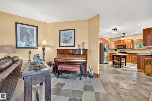 Spacious open-concept layout with tile flooring - 51 Itaska Beach, Rural Leduc County, AB 