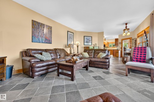 Diamond-patterned stone tile flooring throughout - 51 Itaska Beach, Rural Leduc County, AB 