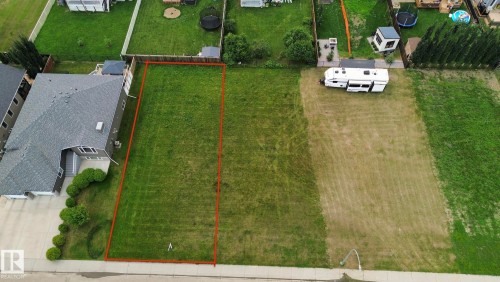 Cleared, level lot with established green space and paved street frontage - 19 Monterey Estates, Wetaskiwin, AB 