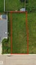 Rectangular lot with maintained green space, featuring a paved street frontage and established neighboring properties - 19 Monterey Estates, Wetaskiwin, AB 