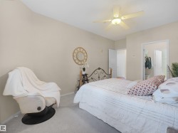 Recessed lighting, ceiling fan, and light-toned wall paint - 