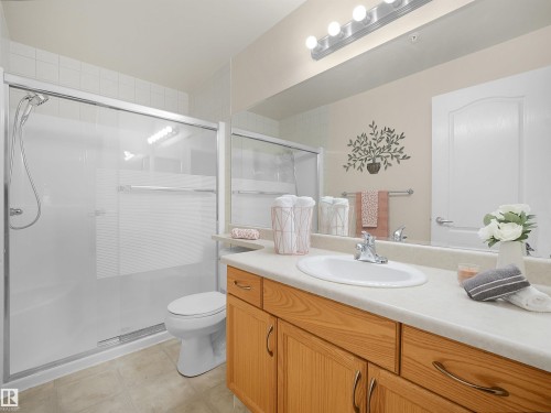 Shower enclosure with sliding glass doors - #206 12111 51 Av Nw, Edmonton, AB 