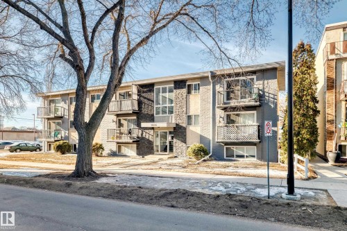 Multi-story building with a stone and stucco facade - #302 10606 123 St Nw, Edmonton, AB 