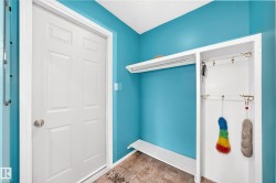 Built-in storage solutions, integrated coat hooks, and durable tiled flooring - 
