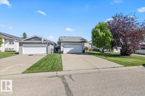 Siding exterior with attached garage - 40 Hampton Place, Stony Plain, AB 