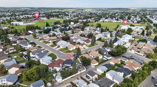 Residential neighborhood with curving streets, mature trees, and a community park - 17103 92 Street Nw, Edmonton, AB 
