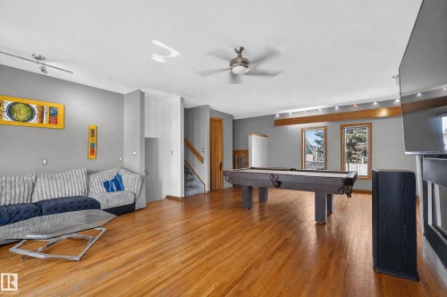 Wood-finish flooring throughout the space - 17103 92 Street Nw, Edmonton, AB 