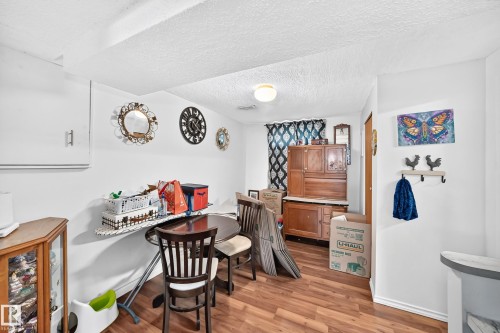 Wood-finish flooring throughout - 11007 37 Avenue Nw, Edmonton, AB 