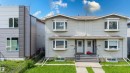 Duplex property with individual entryways, bay windows, and siding exteriors - 10332 161 Street Nw, Edmonton, AB 