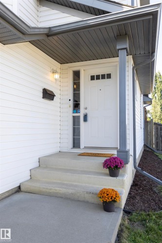 White siding exterior with grey trim - 3575 Mclean Crescent Sw, Edmonton, AB 