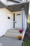 White siding exterior with grey trim - 3575 Mclean Crescent Sw, Edmonton, AB 