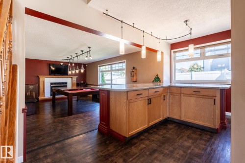 Built-in corner cabinetry with stone-finish countertop - 89 Ozerna Road Nw, Edmonton, AB 