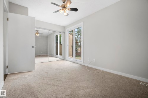 Neutral-toned carpeting throughout - 3173 139 Avenue Nw, Edmonton, AB 