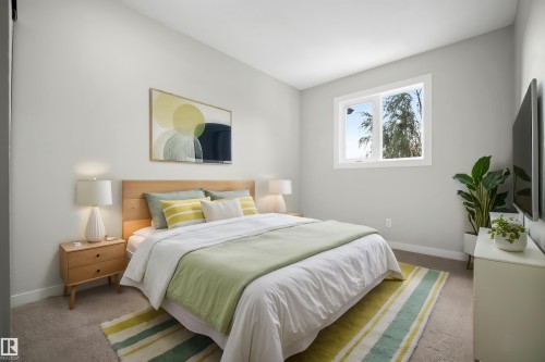 Neutral wall paint with window, light wood-finish headboard, and carpeted flooring - 3173 139 Avenue Nw, Edmonton, AB 