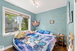 Wood-finish flooring with light blue wall tones - 
