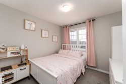 Wall-to-wall carpeting and neutral wall paint - 