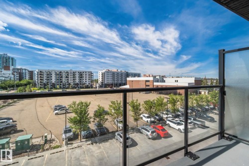 Balcony with glass railing and privacy partition - #404 2755 109 St Nw, Edmonton, AB 