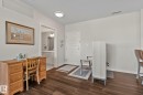 Wood-finish flooring throughout the space - #404 2755 109 St Nw, Edmonton, AB 