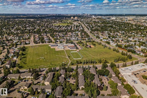 Expansive urban landscape featuring dense residential areas and a prominent central green space - #404 2755 109 St Nw, Edmonton, AB 