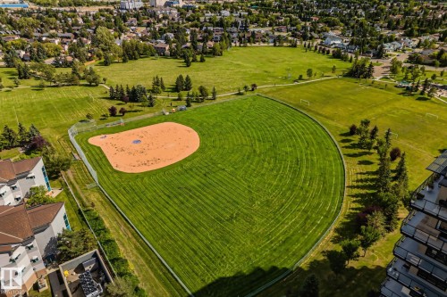 Expansive green spaces featuring a baseball diamond and additional recreational fields - #404 2755 109 St Nw, Edmonton, AB 