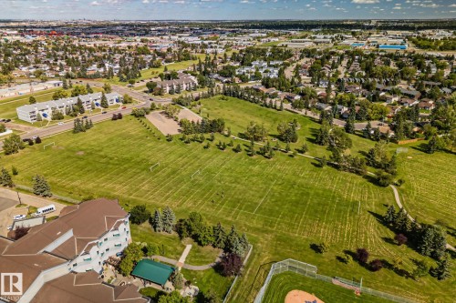 Expansive green space featuring mature trees and recreational fields - #404 2755 109 St Nw, Edmonton, AB 