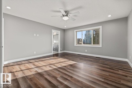 Wood-finish flooring, recessed lighting, and a ceiling fan - 1090 Armitage Crescent Sw, Edmonton, AB 