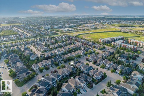 Expansive residential neighborhood with mature landscaping and diverse architectural styles - 1090 Armitage Crescent Sw, Edmonton, AB 