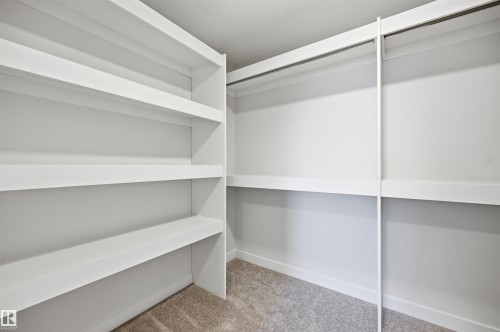 Walk-in Closet Primary Bedroom - 3038 Dixon Landing Sw, Edmonton, AB 