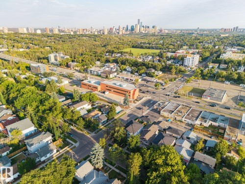 Urban skyline, established tree canopy, mixed-use buildings, residential street, thoroughfare - 8952 81 Avenue Nw, Edmonton, AB 