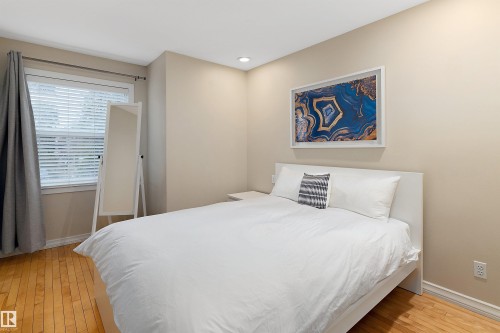 Hardwood flooring, recessed lighting, and a window with blinds - 9654 100 Street Nw, Edmonton, AB 