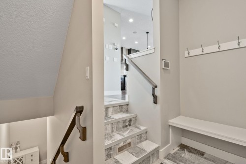 Built-in hall tree with bench seating and coat hooks - 2096 Redtail Common Nw, Edmonton, AB 