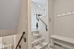 Built-in hall tree with bench seating and coat hooks - 