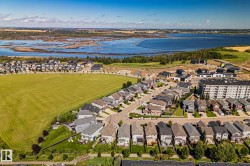 Residential property with a natural water body and expansive green space - 