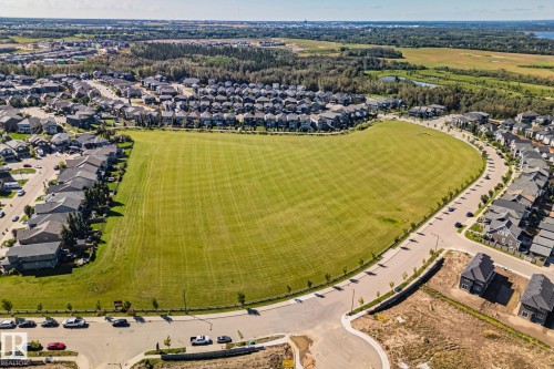 Expansive green space surrounded by residential development - 2096 Redtail Common Nw, Edmonton, AB 