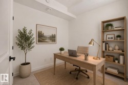 Light-filled room featuring white walls and neutral-toned carpeting - 