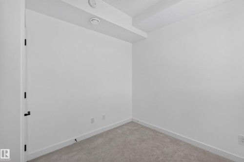 Neutral wall color with a light gray carpet and white trim - #58 16231 19 Av Sw, Edmonton, AB 