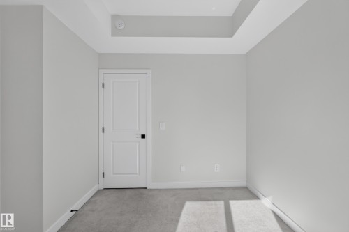 Tray ceiling with recessed lighting - #58 16231 19 Av Sw, Edmonton, AB 