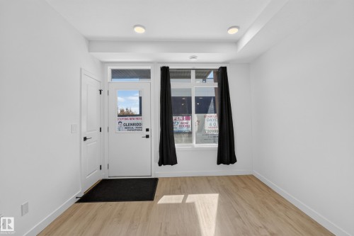 White interior walls with wood-finish flooring - #58 16231 19 Av Sw, Edmonton, AB 