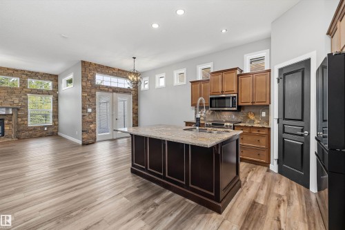 4044 Crowsnest Crescent, Sherwood Park, AB - Indoor Photo Showing Kitchen With Fireplace With Double Sink