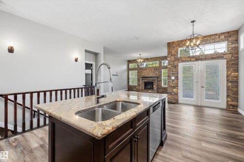 4044 Crowsnest Crescent, Sherwood Park, AB - Indoor Photo Showing Kitchen With Fireplace With Double Sink