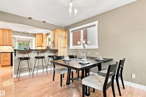 Hardwood-style flooring throughout - 14307 50 Avenue Nw, Edmonton, AB 