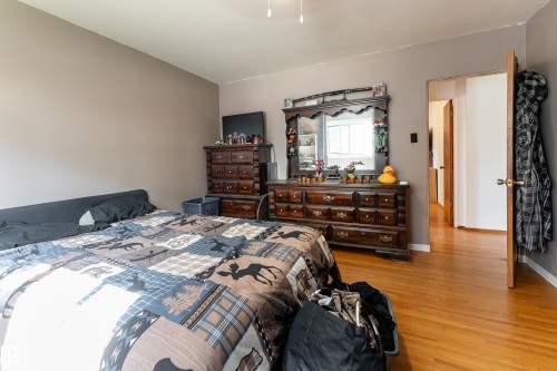 Hardwood-style flooring throughout - 14906 76 Avenue Nw, Edmonton, AB 