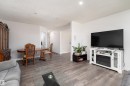 Wood-finish flooring throughout - 13435 101 Street Nw, Edmonton, AB 