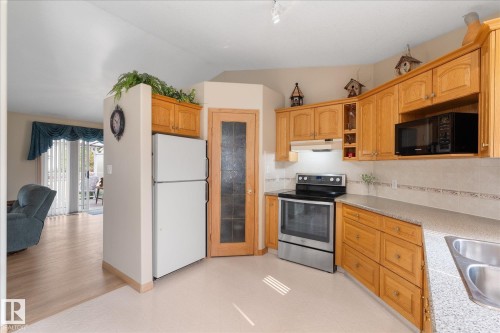 16 Simonette Crescent, Devon, AB - Indoor Photo Showing Kitchen With Double Sink