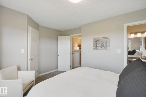 Recessed lighting illuminates the ceiling - #58 4029 Orchards Dr Sw, Edmonton, AB 