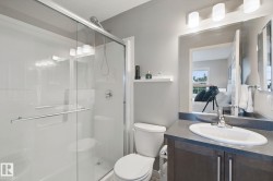 Walk-in shower with clear glass enclosure - 