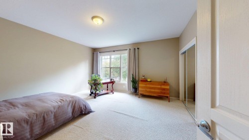Neutral-toned walls complement plush carpeting - 9846 112 Street Nw, Edmonton, AB 