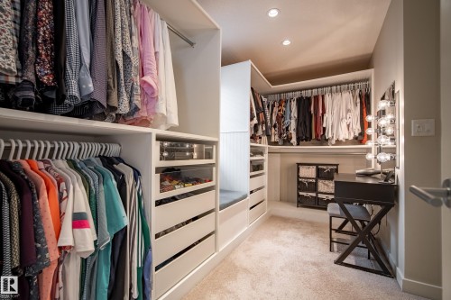 Custom closet system featuring extensive shelving and hanging storage - 5966 Edmonds Crescent Nw, Edmonton, AB - Indoor With Storage