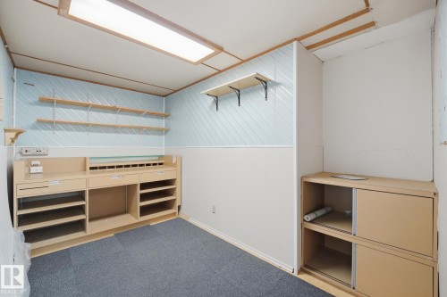 Built-in shelving units, integrated desk space, and wall-mounted shelves - 13304 63 Street Nw, Edmonton, AB 